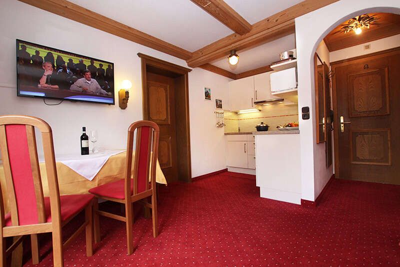 Appartements Rössl mit Küche und Essbereich in Kirchberg in Tirol